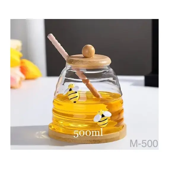 Mbajtese Mjalti Qelq 500ml me Kapak Luge dhe Bazament Druri - ShikoCmimin